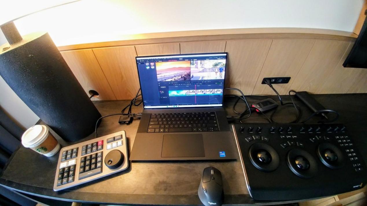 Building Your Post Suite in a Hotel Room: Dell XPS 17 Creator Edition (NVIDIA GeForce RTX 3060), Samsung Thunderbolt 3 Portable SSD 1TB, Blackmagic Design Speed Editor, and DaVinci Resolve Micro Panel. Credit: Y.M.Cinema Magazine