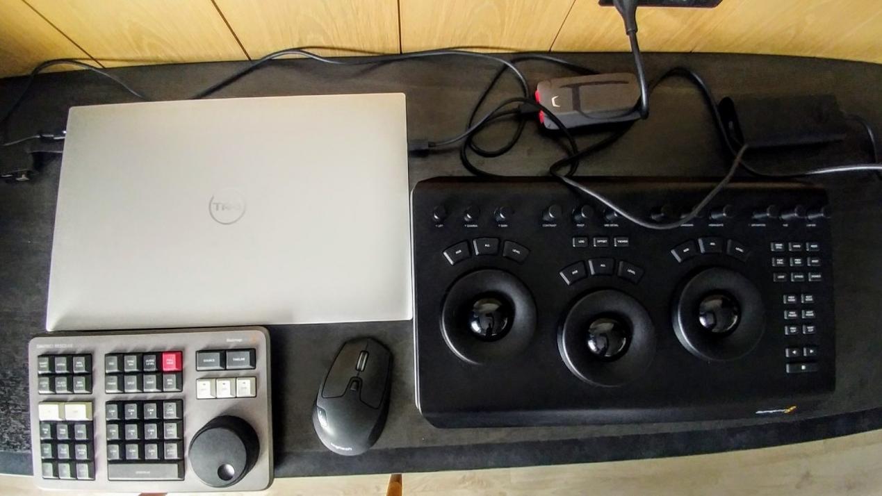 Building Your Post Suite in a Hotel Room: Dell XPS 17 Creator Edition (NVIDIA GeForce RTX 3060), Samsung Thunderbolt 3 Portable SSD 1TB, Blackmagic Design Speed Editor, and DaVinci Resolve Micro Panel. Credit: Y.M.Cinema Magazine