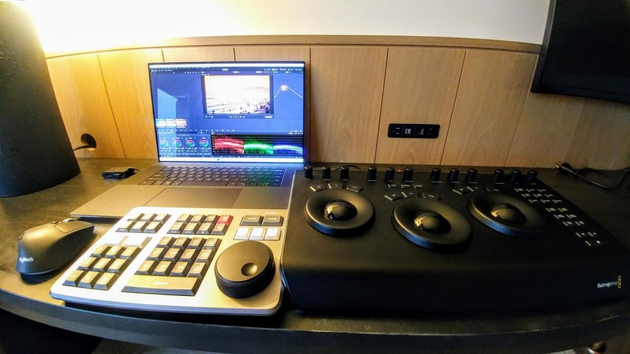 Building Your Post Suite in a Hotel Room: Dell XPS 17 Creator Edition (NVIDIA GeForce RTX 3060), Samsung Thunderbolt 3 Portable SSD 1TB, Blackmagic Design Speed Editor, and DaVinci Resolve Micro Panel. Credit: Y.M.Cinema Magazine