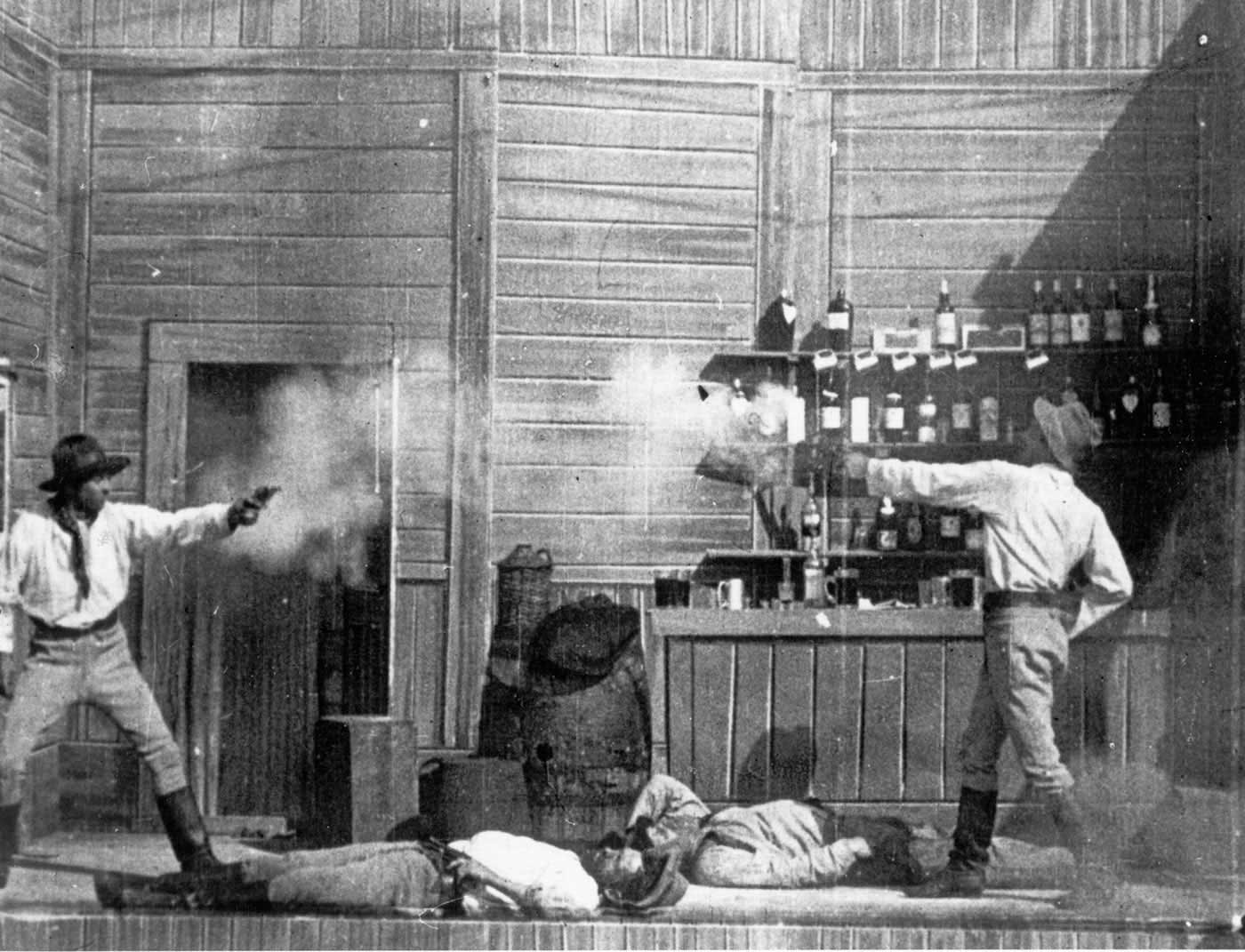 A shooting duel scene from an old black and white movie