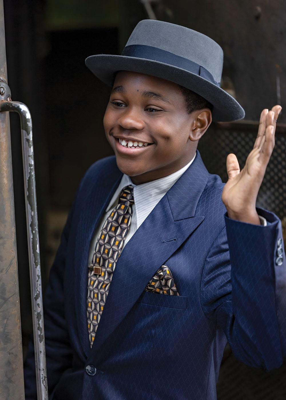 Jalyn Hall as Emmett Till, seen here as he boards a train in Chicago for his fatal visit to Mississippi. Says Hall, “I was really stepping into his shoes, literally and metaphorically. Looking into a mirror, while wearing his clothes, I felt like I was actually him.”