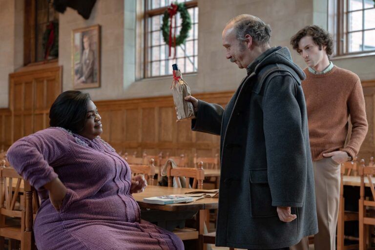 A teacher, a lunch lady, and a student become an oddball chosen family in The Holdovers. Image © Focus Features