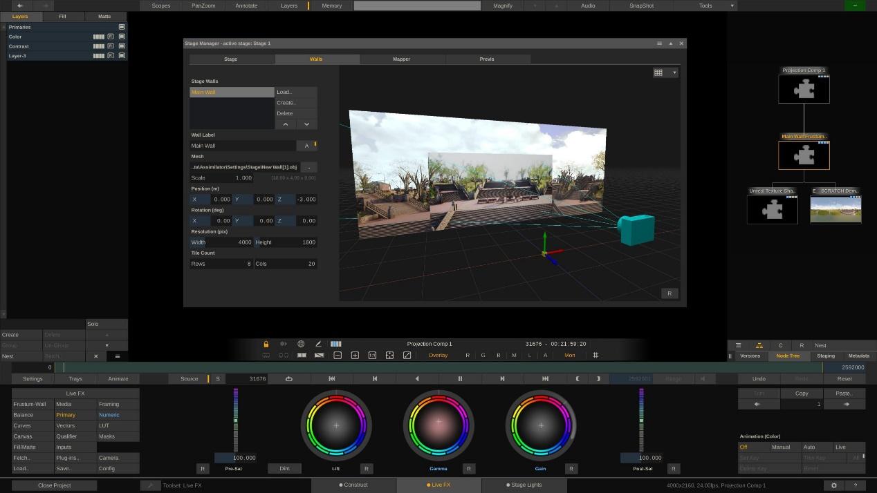 A software interface displaying a 3D scene with an outdoor environment. The workspace includes various panels for settings and adjustments, featuring color wheels and a blue cube in the scene.